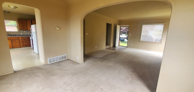 Dining room with view through to the kitchen